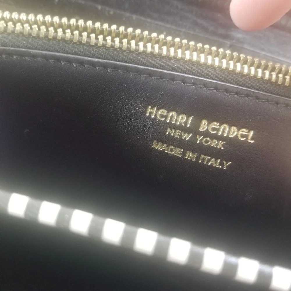 Henri Bendel purple snakeskin embossed leather wallet